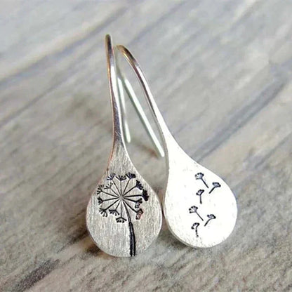 Boucles d'oreilles vintage en argent avec fleurs